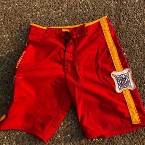 Red Maui Rippers with lifeguard patches